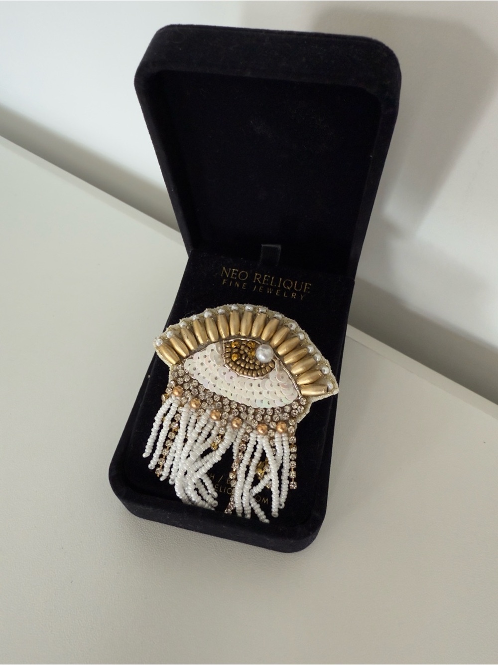 NEO RELIQUE Evil Eye White Sequence Beaded Fringe Brooch